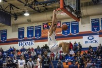 Bishop Gorman center Zach Collins (12) dunks the ball against Overland, Colo., during the ch ...