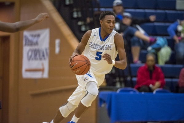 Bishop Gorman guard Chuck O‘Bannon (5) runs with the ball against Overland, Colo., dur ...