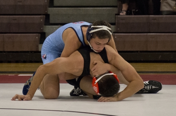 Centennial&lsquo;s Nico Antuna, top, wrestles Chaparral&lsquo;s Julio Bravo during a quad me ...