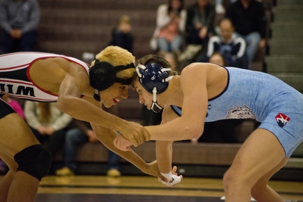 Centennial&lsquo;s Nico Antuna, right, wrestles Las Vegas&lsquo; Aaron Najera during a quad ...