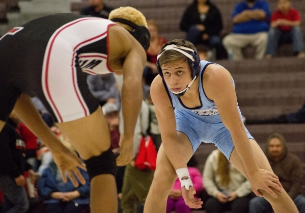 Centennial&lsquo;s Nico Antuna, right, wrestles Las Vegas&lsquo; Aaron Najera during a quad ...