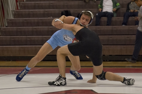 Centennial&lsquo;s Nico Antuna, left, wrestles Chaparral&lsquo;s Julio Bravo during a quad m ...