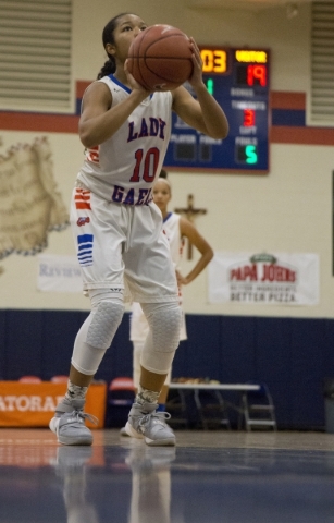 Bishop Gorman‘s Aja Phoumiphat (10) attempts a free throw during their game against Ca ...