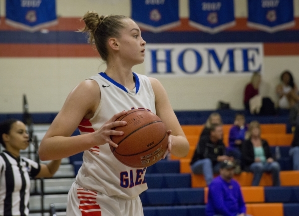 Bishop Gorman‘s Megan Jacobs (23) looks to pass the ball into play during their game a ...