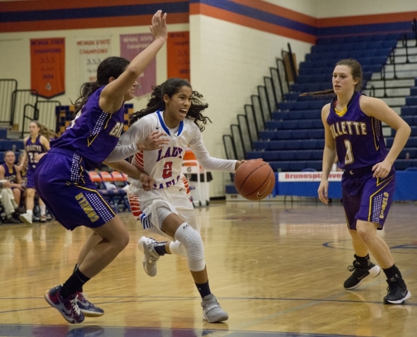 Bishop Gorman‘s Shaira Young (2) works the ball around Campbell County (Wyo.) players ...