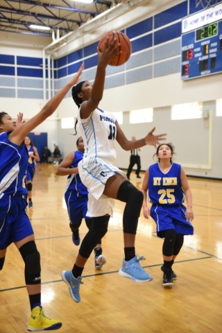 Canyon Springs Dayonna Maddox (11) shoots a layup against California‘s Mount Eden defe ...
