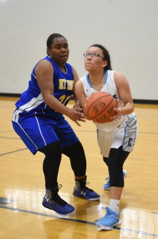 Canyon Springs Kendra Dora (21), right, makes a move on California‘s Mount Eden Mae&ls ...