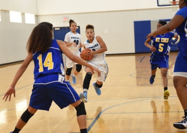 Canyon Springs Aleza Bell (2) drives towards the hoop against California‘s Mount Eden ...