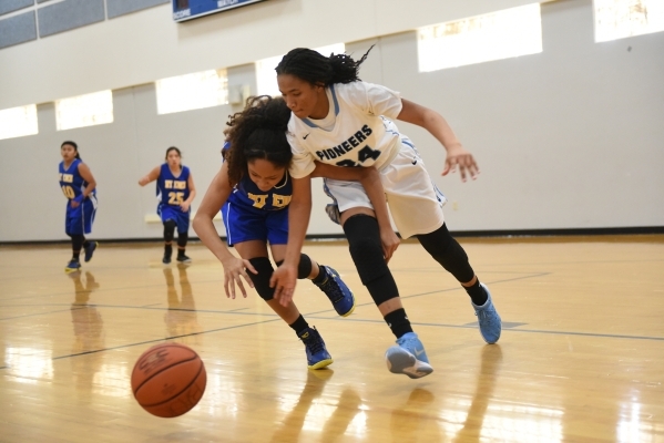 Canyon Springs Monica Brass (24), right, fights for the ball against California‘s Moun ...