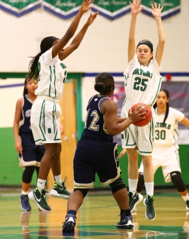 Cheyenne‘s Morrisha Harden (12) looks for an open pass as Green Valley‘s Jamaica ...