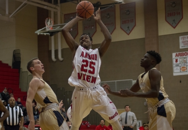 Arbor View‘­s Jarrod Burks (25) takes the ball to the basket during their home game a ...