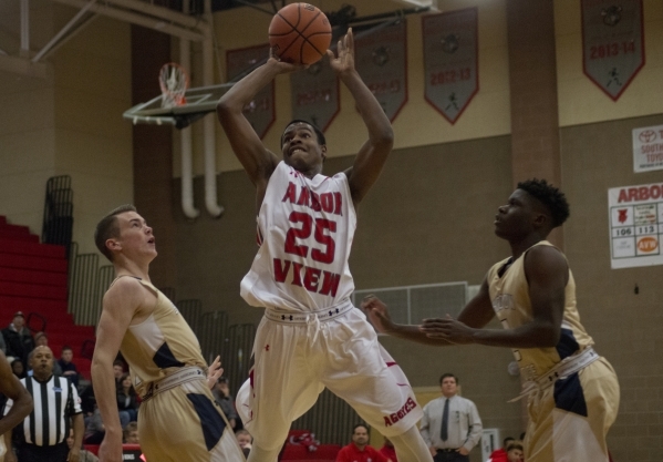 Arbor View‘s Jarrod Burks (25) takes the ball to the basket during their home game a ...