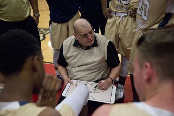 Shadow Ridge High School head coach Ray Miller speaks to his team during their game at Arbor ...