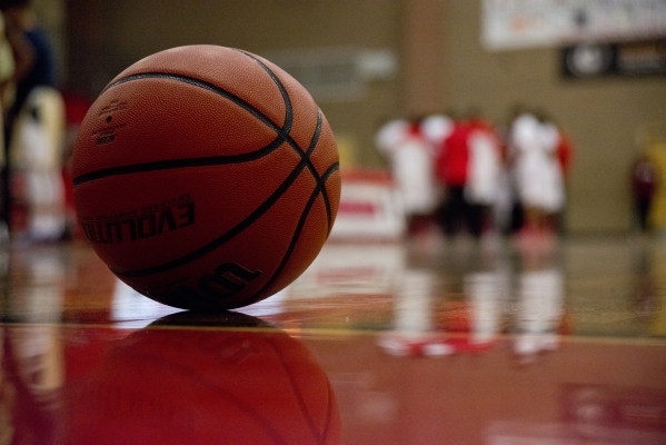 A basketball sits ready for play as Arbor View and Shadow Ridge take a timeout during their ...