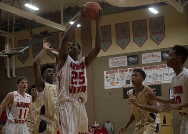 Arbor View‘s Jarrod Burks (25) takes the ball to the basket during their home game a ...