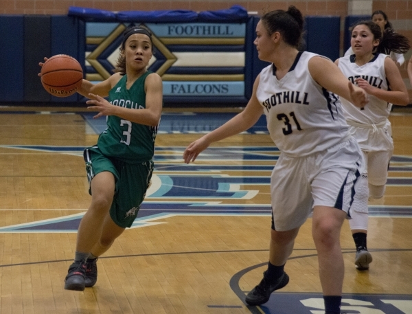 Rancho‘s Maureen Macato (3) looks to move the ball past FoothillÃ­s Bri Rosales (31) ...