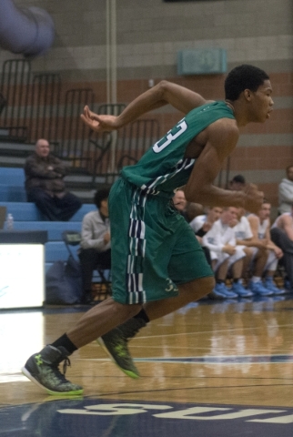 Rancho‘s Lamont Traylor (33) runs toward a loose ball during their game at Foothill Hi ...