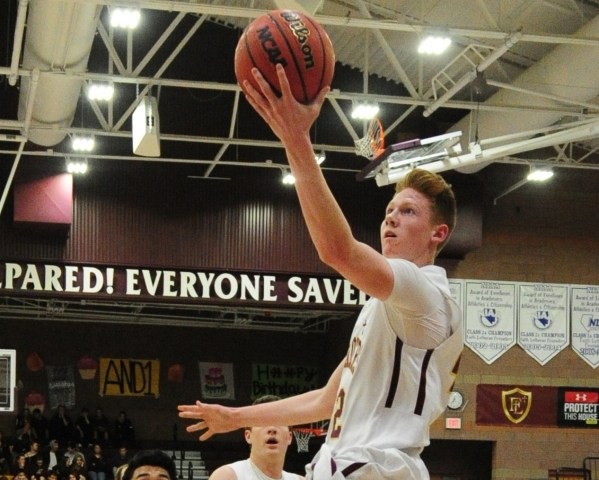 Faith Lutheran forward Elijah Kothe goes up for a shot against Sierra Vista in the first hal ...