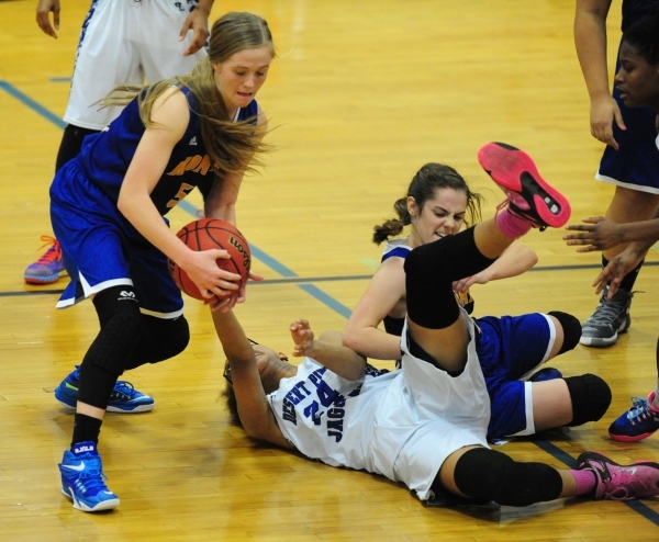 Moapa Valley guard Kinlee Marshall, left, steals the ball from Desert Pines center Brianna F ...