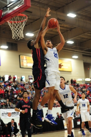 Bishop Gorman forward Ryan Kiley (23) goes up for a shot against Findlay Prep guard Oshae Br ...