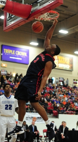Findlay Prep guard Carlos Johnson dunks against Bishop Gorman in the third quarter of their ...