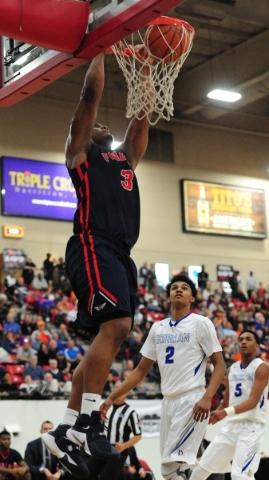 Findlay Prep guard Carlos Johnson dunks against Bishop Gorman in the third quarter of their ...