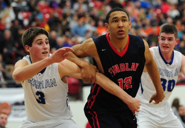 Findlay Prep guard Tristan Clark (12) and Bishop Gorman forward Byron Frohnen (3) tie each o ...