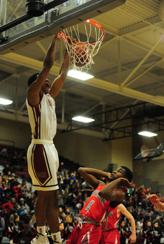 Desert Oasis forward Aamondae Coleman (5) dunks in front of Arbor View guard Favor Chukwulel ...