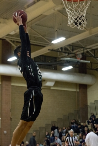 Palo Verdeës Taylor Miller (22) goes up for a dunk during their game against Legacy at Le ...
