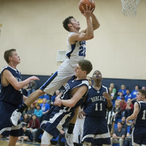 Calvary Chapel‘s Kilian Diers (22) goes up for a shot in the boy‘s basketball ga ...