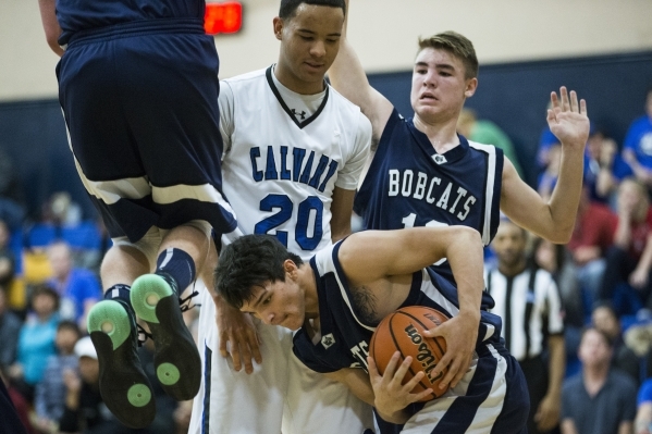 White Pine‘s Dakoda Barela (23) grabs procession of the ball in the boy‘s basket ...