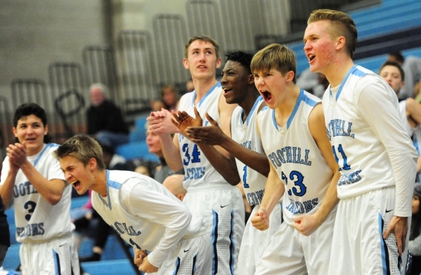 The Foothill bench reacts after taking the lead from Eldorado in the fourth quarter of their ...