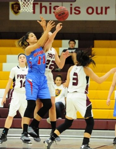 Western forward Destiny Gonzalez (11) attempts to steal a pass against Faith Lutheran Emily ...
