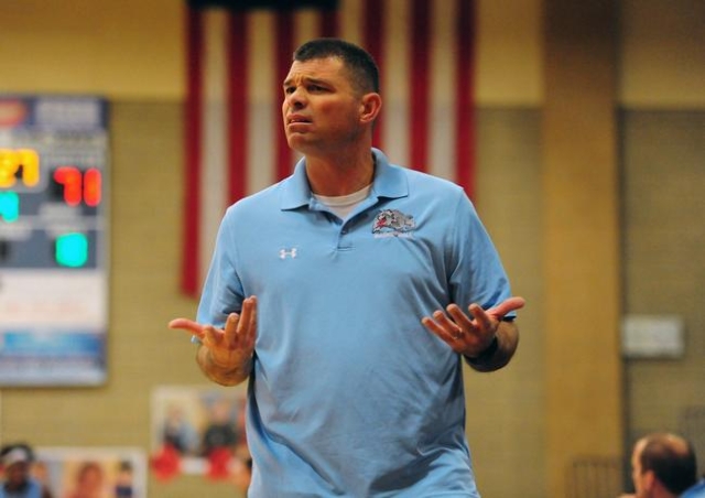 Centennial head boys basketball coach Todd Allen doesn‘t agree with a referee‘s ...