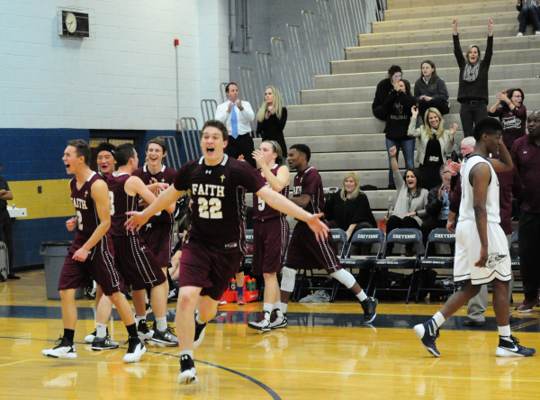Faith Lutheran players celebrate their 97-89 quadruple overtime win over Cheyenne during the ...