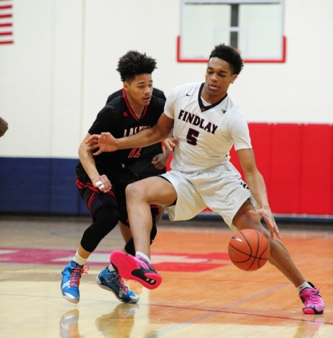 Findlay Prep guard P.J. Washington (5) dribbles the ball up-court while Las Vegas guard Dono ...