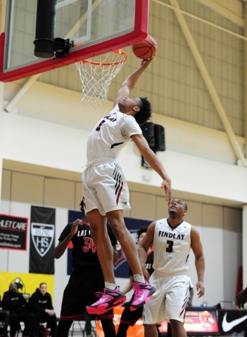 Findlay Prep guard P.J. Washington dunks against Las Vegas High on the first drive of the ga ...