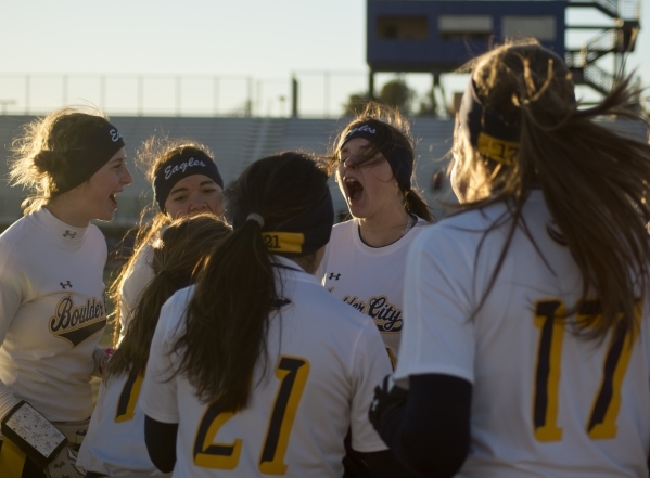 The Boulder City High School flag football team cheers before heading out onto the field for ...