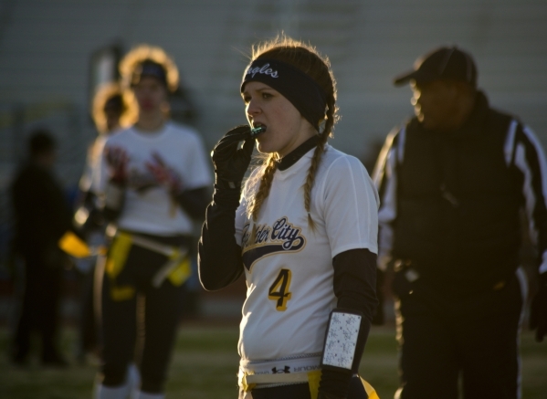 Boulder City quarterback Jeanne Carmell (14) runs the ball up the field during their game ag ...