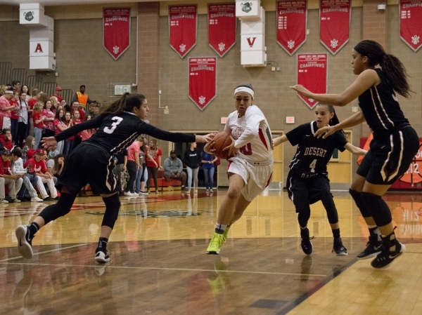 Arbor ViewÂ´s Tiffani Smith (10) drives to the basket during their game against Desert Oas ...