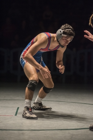 Valley‘s Ulises Munguia, left, wrestles Green Valley‘s Tyler Dockery during thei ...