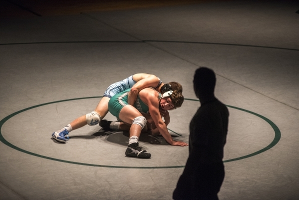 Foothill‘s Wyatt English, top, wrestles Green Valley‘s Cody Chamberlin during th ...