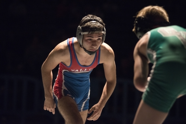 Valley‘s Ulises Munguia, left, wrestles Green Valley‘s Tyler Dockery during thei ...