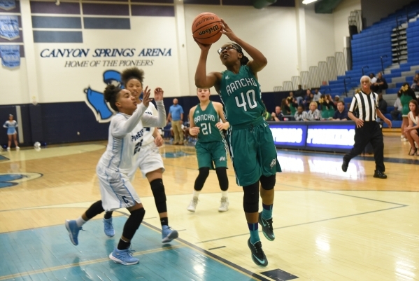 Rancho‘s Alesse Hall (40) goes up for a shot against Canyon Springs D‘Licya Feas ...