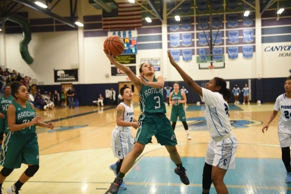 Rancho‘s Maureen Macato (3) goes up for a shot against Canyon Springs Alexia Thrower ( ...