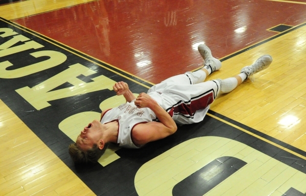 Desert Oasis forward Jacob Heese (32) reacts after being called for an offensive foul agains ...