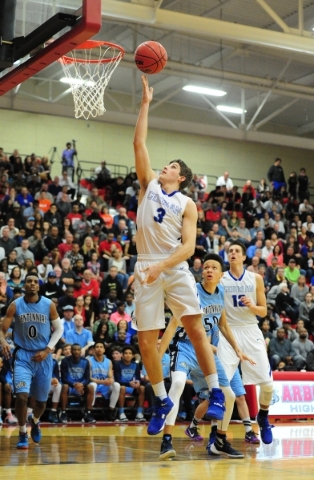 Bishop Gorman forward Byron Frohnen (3) goes up for a shot against Centennial in the first q ...