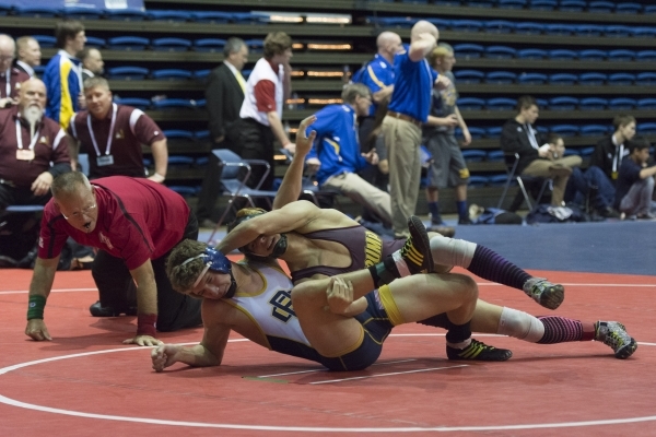 Gino Gusman, right, of Pahrump Valley High School wrestles Jimmy Brown of Boulder City High ...