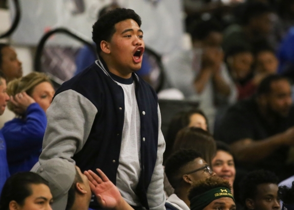 A Desert Pines High School fan argues a call during the I-A Southern boys basketball final a ...