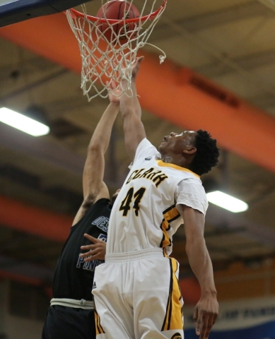 Clark High School senior Darius Jackson (44) and Desert Pines High School junior Trevon Abdu ...